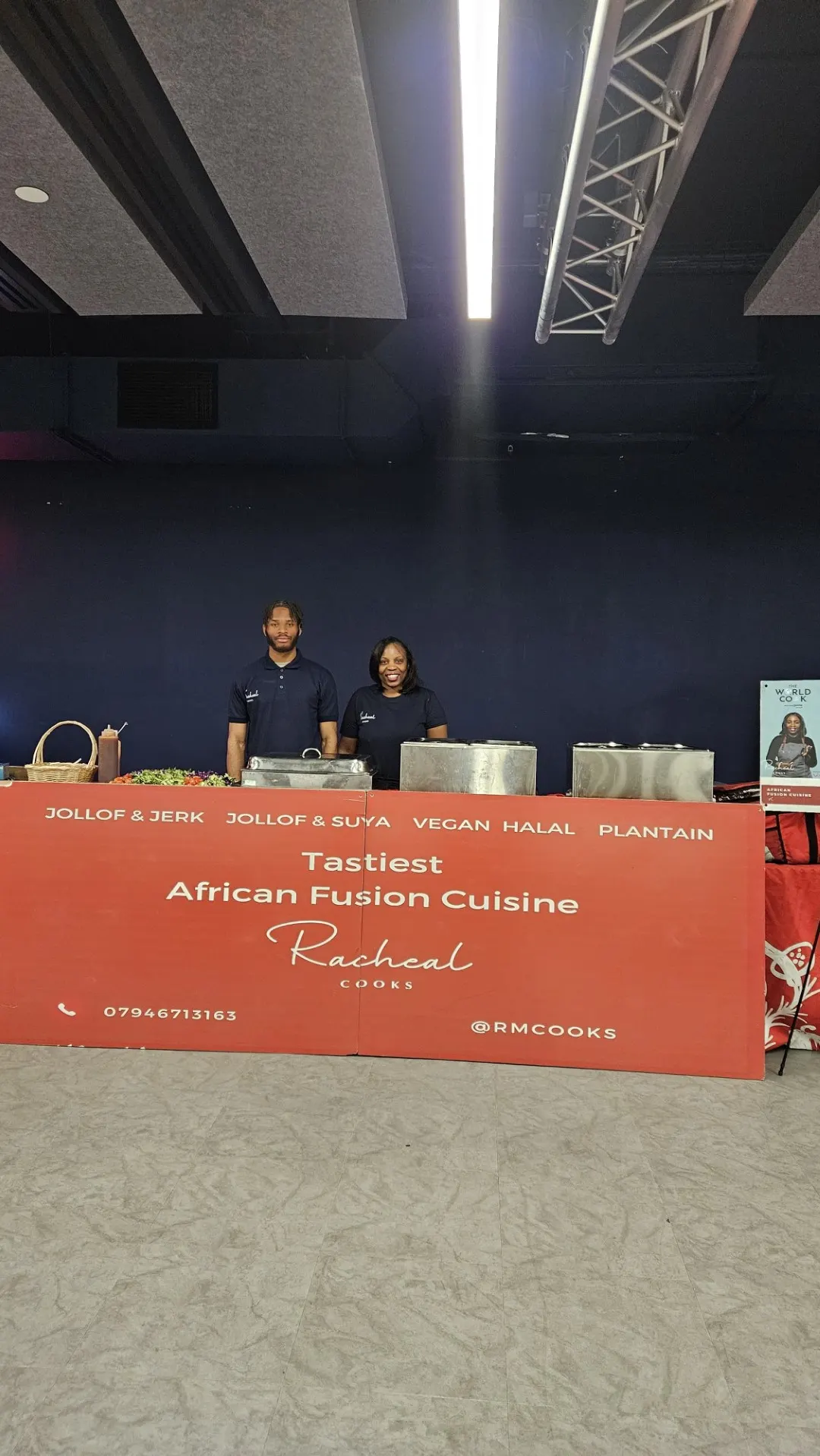 Corporate catering set-up with the Racheal Cooks banner